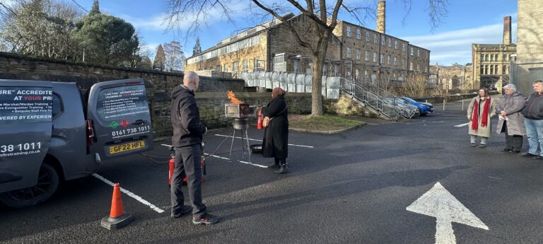 Live fire extinguisher practical training delivered to Burnley Council staff by North West Fire Training
